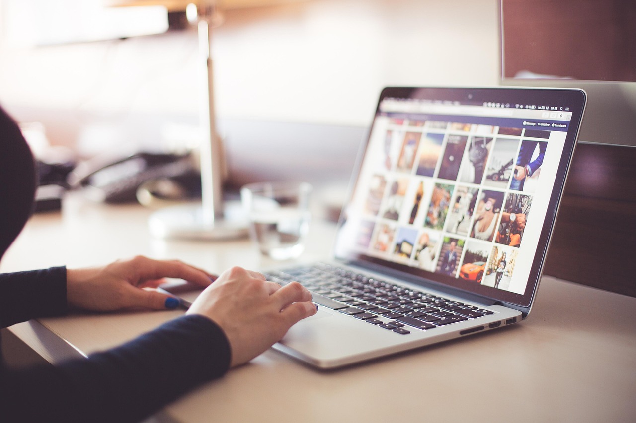 Computer, desk, typing — Top 5 Qualities to Look for in a Castle Rock Bail Bondsman
